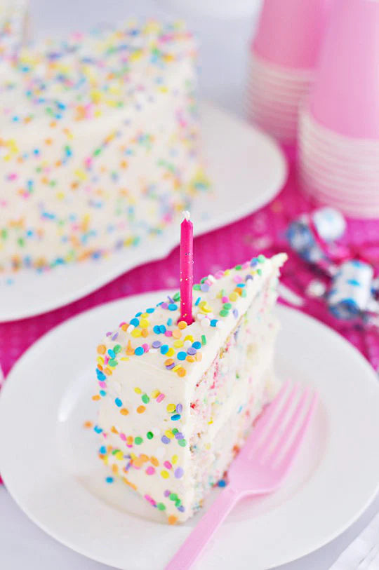funfetti cake with sprinkles and whipped frosting